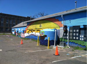 A cistern was installed at a Paterson School by Paterson SMART partners Rutgers Cooperative Extension Water Resources Program and Passaic Valley Sewerage Commission in May 2015 to bring water to rain gardens.