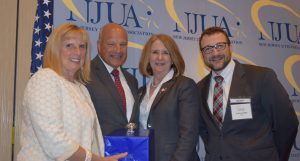 Photo: (left to right) The Hon. Mary-Anna Holden, commissioner, NJ Board of Public Utilities; Robert Iacullo, NJUA’s 2016 Distinguished Service Award recipient; Mary Patricia Keefe, chairperson, NJUA and vice president, regulatory affairs and business support, Elizabethtown Gas; Andrew Hendry, president and CEO, NJUA.