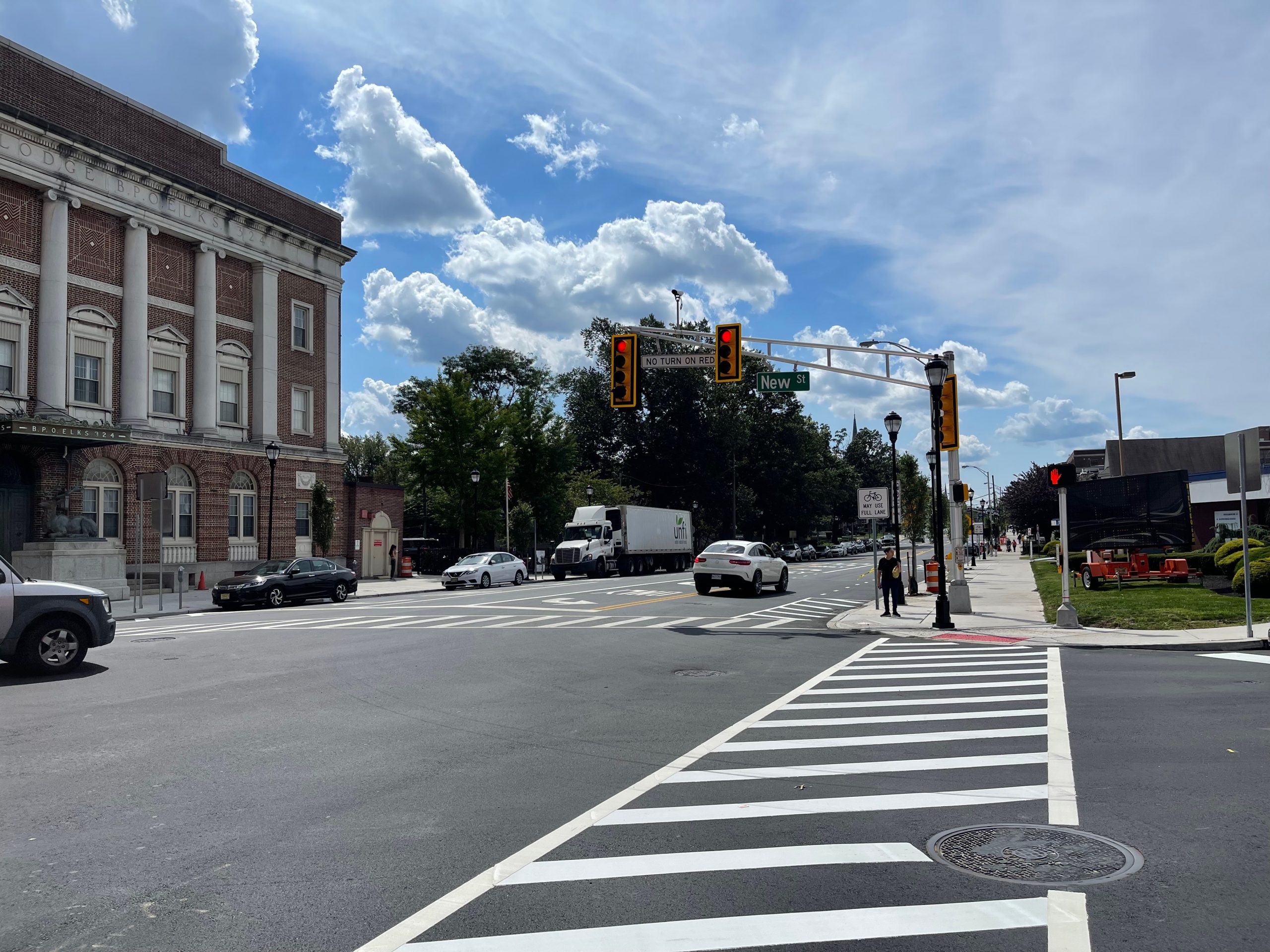 While crossing a road without zebra crossing, one must proceed only if