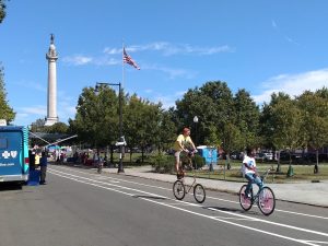 Man on tall bike